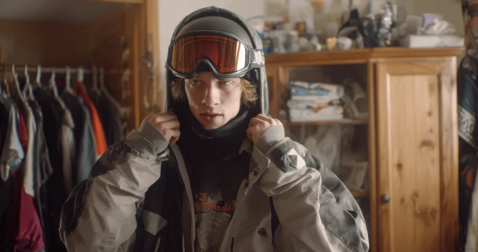 a young guy wearing ski jacket